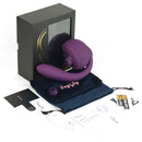 Tracy's Dog OG3 Detachable Clitoral Sucking Vibrator with packaging and accessories displayed in a stylish setting.