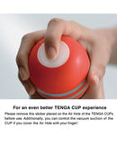 User demonstrating the Tenga U.S Original Vacuum Cup Gentle with sticker removal instructions for enhanced experience.
