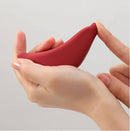 Tenga Iroha Plus Tori Massager held in hands, showcasing its ergonomic design and soft silicone finish.