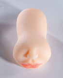 Sugar Babes Lucy Realistic Mouth Stroker Ivory shown from above with lifelike details and mouth-shaped entry.
