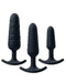Trio anal plug set with three black weighted plugs in varying sizes and textures for beginners and experts.