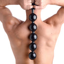 Master Series Black Baller Anal Beads showcased on a person's back, illustrating bold fullness and sensory pleasure.