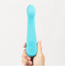 Tenga Iroha Tuki Aonami held in hand, showcasing its sleek design and intuitive control buttons.