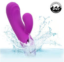 Kroma Turbo Passion Silicone Dual Stimulator Purple splashing in water, showcasing its waterproof feature.