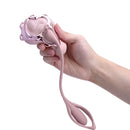 Discreet Wearable Panty Massager with Detachable Egg Vibrator held in hand, featuring sleek design and easy controls.