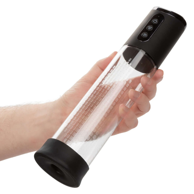 Hand holding Peak Rechargeable Pump for enhanced personal pleasure with advanced automatic suction and precision.