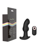 Gender Fluid Frission Anal Vibe with Remote Black next to its packaging, showcasing hands-free anal pleasure.