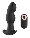 Gender Fluid Frission Anal Vibe with Remote Black alongside its remote control for hands-free pleasure.