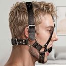 Strict Leather Ball Gag Harness Black on a model, showcasing a polished design for restraint and control.