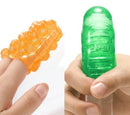 Tenga Uni Variety Pack featuring orange and green pleasure sleeves for customizable stimulation.
