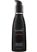 Wicked Ultra Silicone Lubricant 4 Oz in a sleek black bottle with a pump dispenser, featuring a fragrance-free formula.