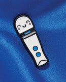 Wood Rocket Magic Wand Kawaii Micro Pin on blue fabric background, showcasing playful design and charm.