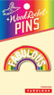 Fabulous" enamel pin with LGBTQ rainbow design on gold base by Wood Rocket Pins