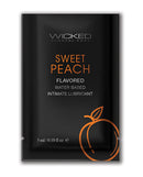 Wicked Sensual Care Waterbased Lubricant 0.1 Oz Sweet Peach in a compact travel-ready sachet.
