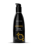 Wicked Sensual Care Aqua Water Based Lube 2 oz Butterscotch flavored lubricant bottle with pump top.