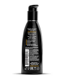 Wicked Sensual Care Aqua Water Based Lube 2 oz Butterscotch bottle with ingredient details.