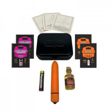 Kama Sutra Weekender Vibe Kit in Tropical Mango with mini bullet vibe, sensual essentials, travel case, and accessories.