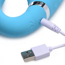 Strap U Mighty Rider 10X Vibrating Strapless Strap On Blue charging with USB cable.