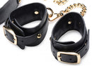 Master Series Black & Gold Bondage Set featuring elegant black leather cuffs with gold accents and chains.