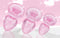 Booty Sparks Glitter Gem Anal Plug Set in pink, featuring smooth, tapered designs in varying sizes with sparkling glitter.