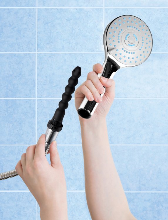 CleanStream Shower Head with Silicone Nozzle held in hands, designed for convenient enema access while showering.