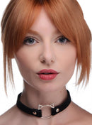 Model wearing the Master Series Kinky Kitty Ring Slim Choker Black, showcasing its stylish and playful design.