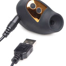 Inmi Shegasm Mini 12X Clit Stimulator Black with USB charging cable and control buttons.