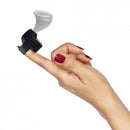 Inmi Shegasm Mini 12X Clit Stimulator Black held on a finger, showcasing its compact design and powerful suction feature.