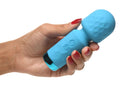 Hand holding the Bang! 10X Mini Silicone Rechargeable Wand in blue, perfect for discreet travel and intimate moments.