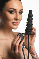 Master Series Ass Puffer Nubbed Inflatable Silicone Anal Plug displayed by a model with textured design for stimulation.