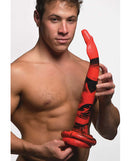Creature Cocks King Cobra 18 inches Long Silicone Dong held by a model, showcasing its bold design and premium materials.