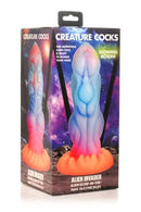 Creature Cocks Alien Invaders Glow In The Dark Dildo packaging featuring vibrant colors and extraterrestrial design.