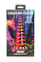 Creature Cocks Twilight Rainbow Glass Dildo packaging with iridescent unicorn horn design and pink-yellow gold hues. Embark on a mystical journey.