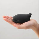 Tenga Iroha Plus Yoru Massager held in an open hand, showcasing its ergonomic design and soft-touch finish.