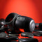 Zero Tolerance Wet It Be vibrating lubricating stroker ring on black stones with red background