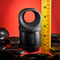 Zero Tolerance Wet It Be vibrating lubricating stroker ring with ergonomic button, displayed next to a measuring tape on a red background.