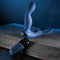 Zero Tolerance By All Means remote control prostate vibrator with Turbo Mode on a wooden surface