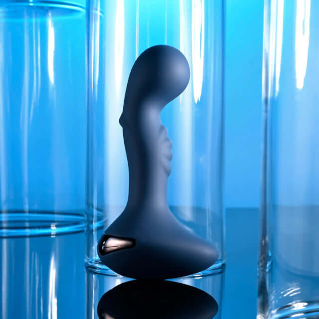 Blue Oasis vibrating silicone plug with textured shaft and ergonomic handle in sleek design.