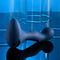 Zero Tolerance Blue Oasis vibrating silicone plug with ergonomic handle against a blue background.