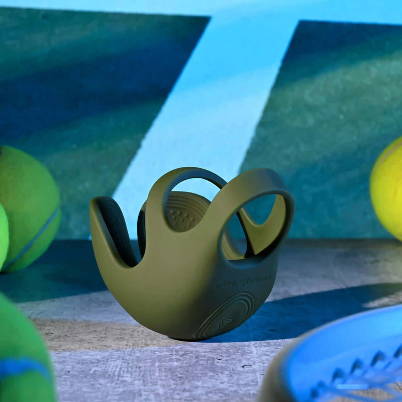 Zero Tolerance Nutty Buddy Rechargeable Silicone Dual Cock Ring in green, featuring textured shield and stretchy loops.
