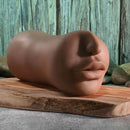 Channel Heart Movie & Realistic Kiss & Tell Stroker displayed on a wooden surface, showcasing ultra-realistic features.
