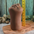 Channel Heart Movie & Realistic Kiss & Tell Stroker shown next to a ruler for size reference on a wooden surface.