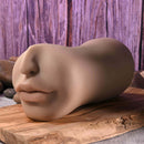 Riley Reid Movie Download with Realistic Kiss & Tell Stroker displayed on wooden surface.