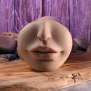 Riley Reid Movie Download with Realistic Kiss & Tell Stroker close-up view of lifelike mouth on a wooden surface.