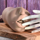 Riley Reid Movie Download with Realistic Kiss & Tell Stroker showcasing a life-like suction toy with detailed features.