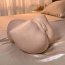 Squirt For Me XL Riley Reid Movie & Realistic Squirting Stroker on a bed, showcasing its realistic design and texture.