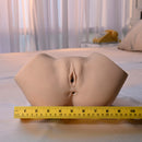 Squirt For Me Sasha Grey Realistic Masturbator with Movie displayed on a table with measuring tape for size reference.