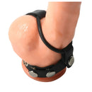Strict Leather Rubber Cock Ring Harness Black on a silicone model, showcasing its design for enhanced support and display.