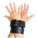Hands secured with Strict Leather 65 Inch Bondage Strap, showcasing versatile leather restraint and adjustability.