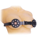 Strict Leather Spiked Breast Binder with Nipple Holes displaying spiked leather disks and buckle design.